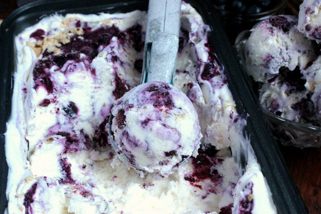 You don’t even need an ice cream maker to make this sweet dessert! This No Churn Blueberry Cheesecake Ice Cream is swirled with a blueberry cheesecake filling and crushed graham crackers!