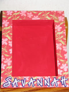 Custom Photo Frame - Red Photo Frame with Flower Scrapbook paper and the name Savannah on the bottom of the frame