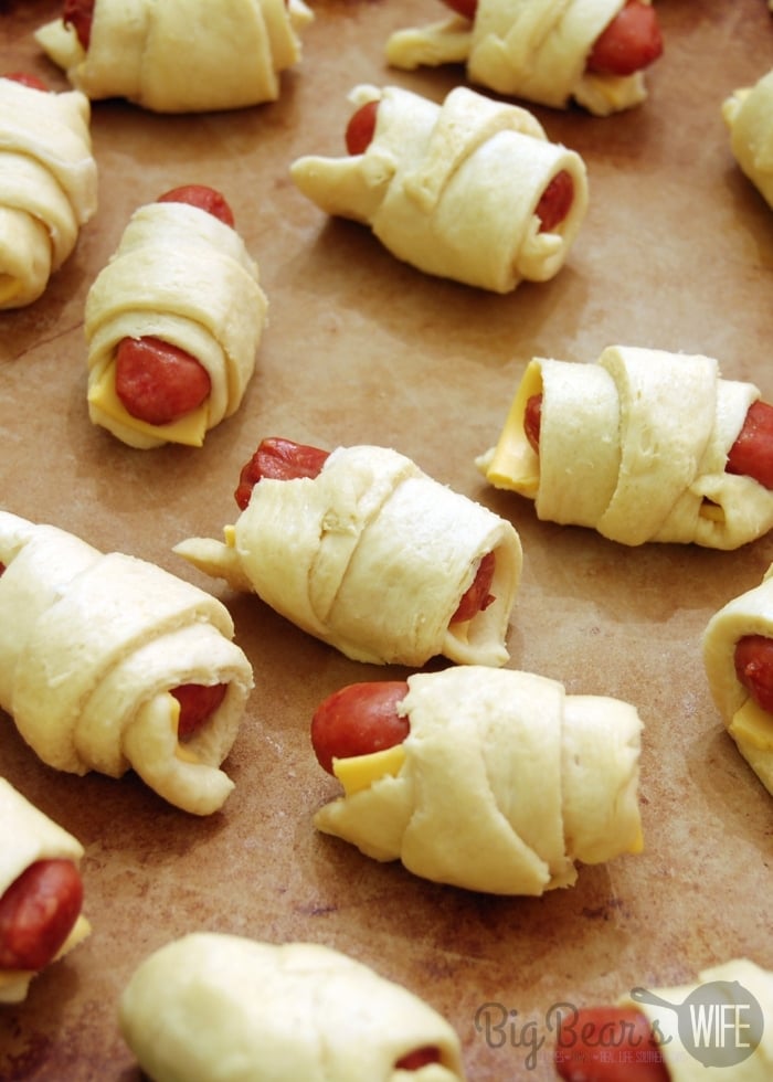 raw PIGS IN A BLANKET on baking sheet