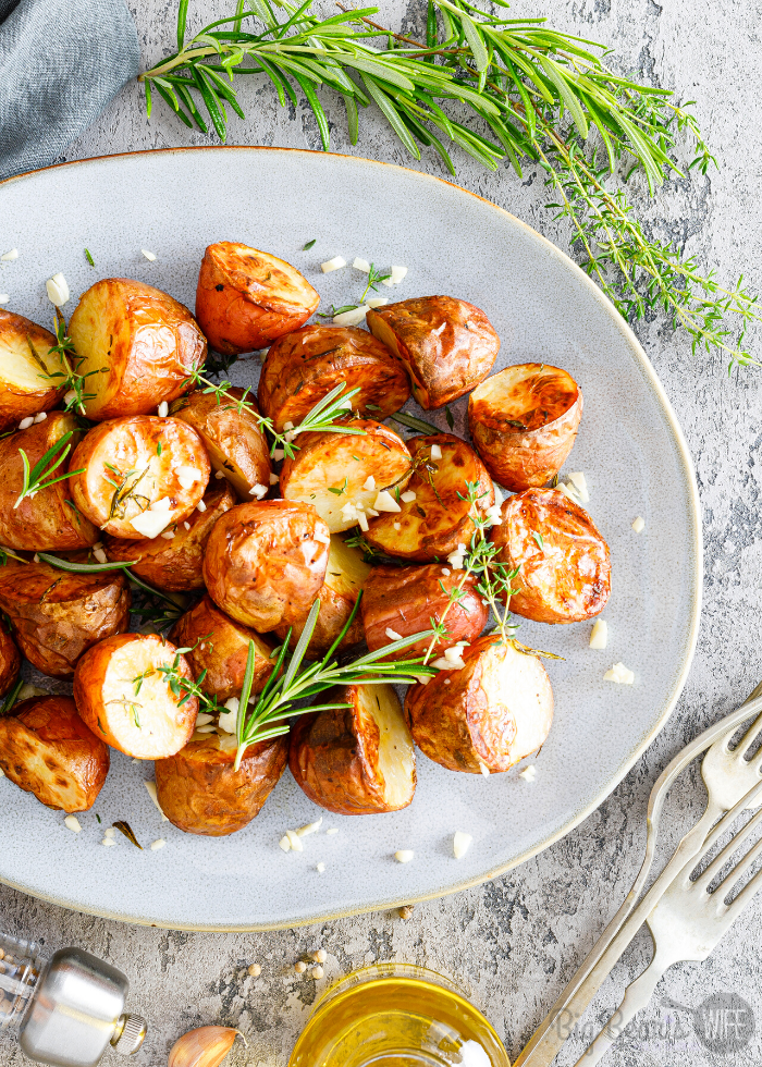 This easy Garlic Rosemary Potatoes side dish is ready in under an hour! It's great for Thanksgiving, Christmas or just as a side for a fabulous dinner any time of year!