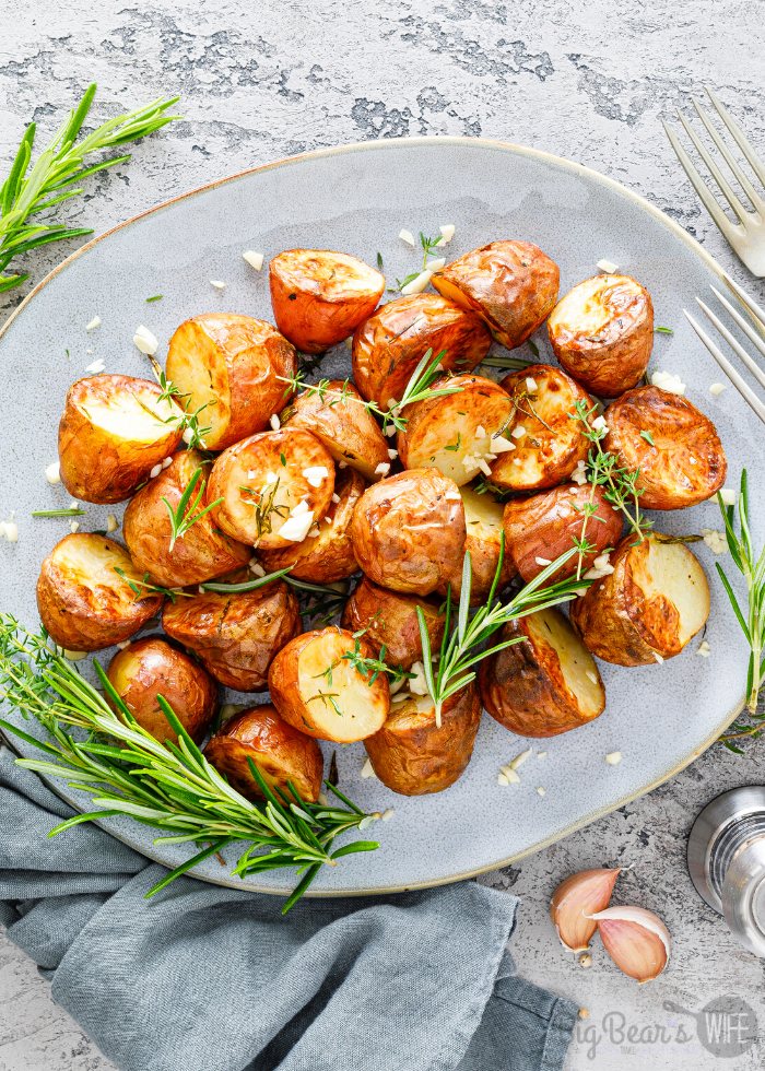 This easy Garlic Rosemary Potatoes side dish is ready in under an hour! It's great for Thanksgiving, Christmas or just as a side for a fabulous dinner any time of year!