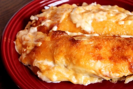 These easy Cheesy Chicken Roll Ups remind me of cheesy chicken enchiladas! The're easy to make and super delicious! 