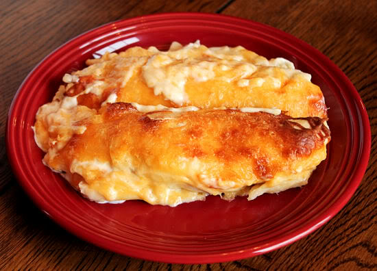 These easy Cheesy Chicken Roll Ups remind me of cheesy chicken enchiladas! The're easy to make and super delicious! 