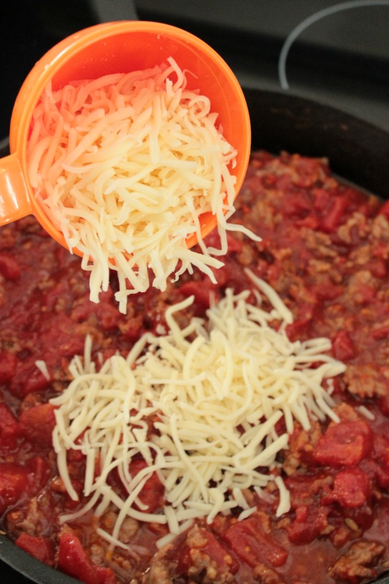 Add the cheese for the Skillet Lasagna