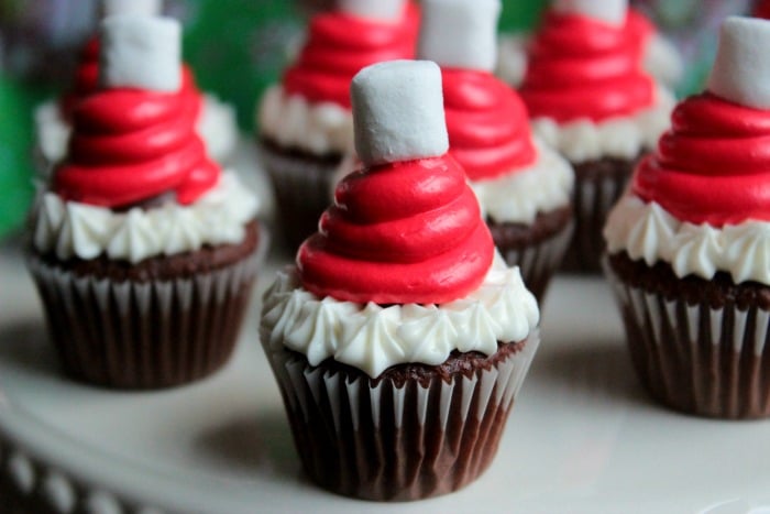 Mini Santa Hat Cupcakes - with Candy Cane Kiss Centers! HO HO HO! A Mini Santa Hat Cupcake!