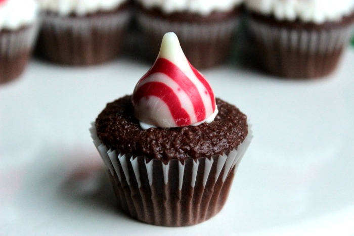 Steps to make Mini Santa Hat Cupcakes - with Candy Cane Kiss Centers