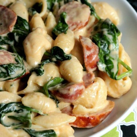 This creamy Sausage and Spinach Alfredo always gets rave reviews when friends and family make it! It's so easy and so delicious! 