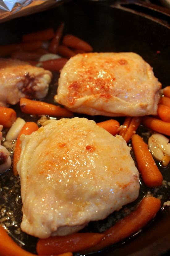 Garlic Roasted Chicken Thighs - Cooking chicken in the oven like this makes the most delicious chicken that's no where near dry and doesn't need 200 gallons of sauce on it to mask the dryness. Like you literally have no idea how much we love this. 