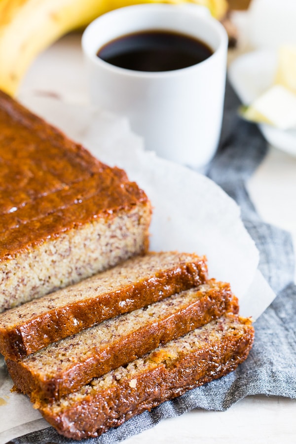 This coconut rum lime glazed banana bread is perfectly moist and glazed with the most delicious brown sugar coconut rum lime mixture. It's perfectly sweet and the perfect way to use up all those browning bananas. It's time to get into the kitchen and start baking! 