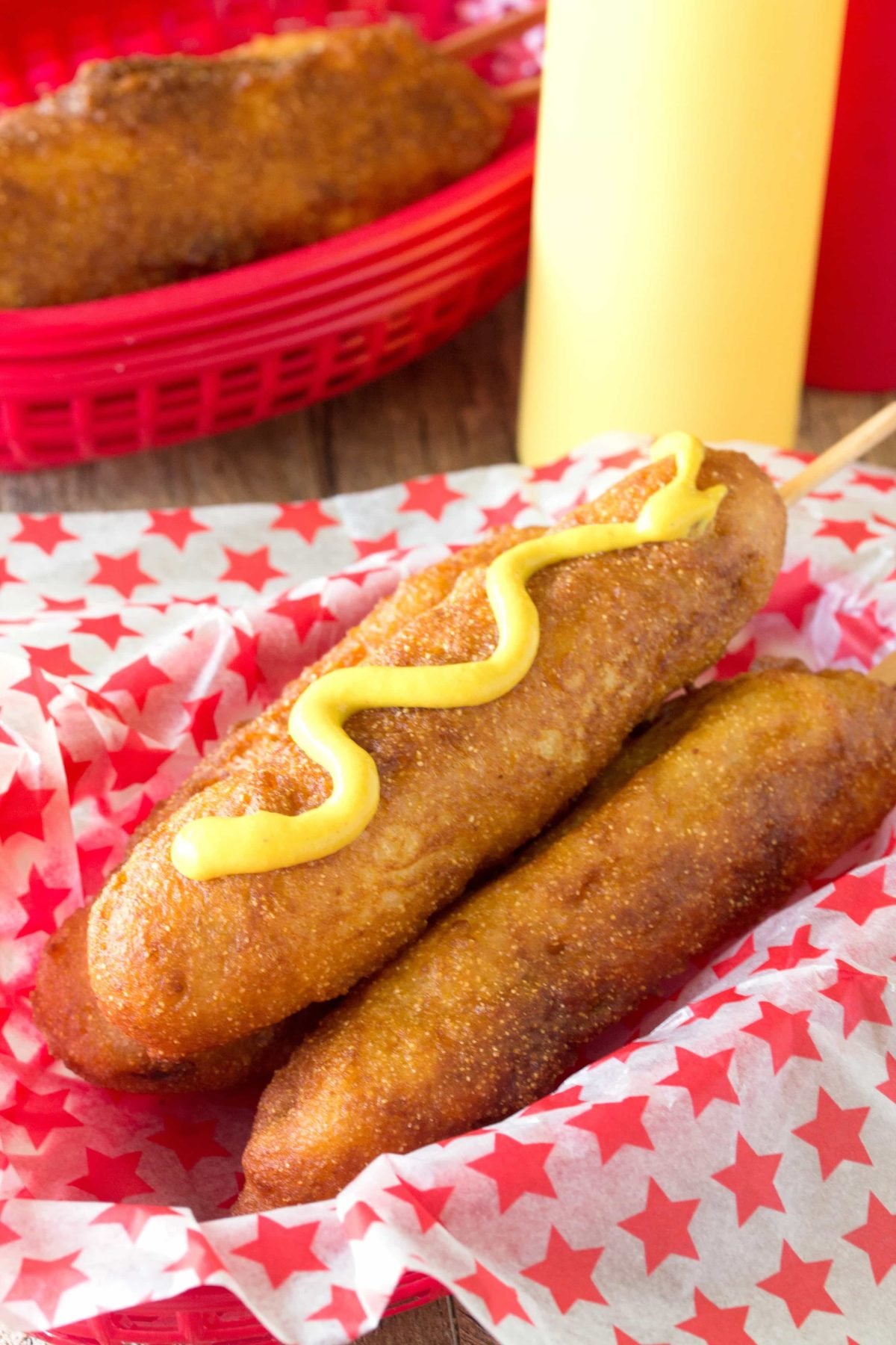 These Disneyland-Style Hand Dipped Corn Dogs are covered with a thick cornbread coating and fried to golden brown perfection. It’s just like they make them on Main Street at Disneyland’s Little Red Wagon. 