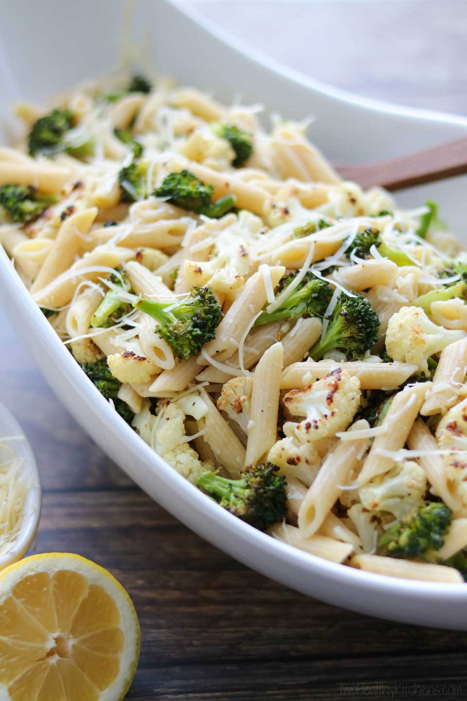 This Broccoli and Cauliflower Pasta gets big flavors from the oven-roasted vegetables, plus the simple additions of garlic, lemon juice and parmesan cheese. Such an easy dinner recipe, yet so deliciously satisfying! A great vegetarian meal with so much flavor that you’ll never miss the meat!