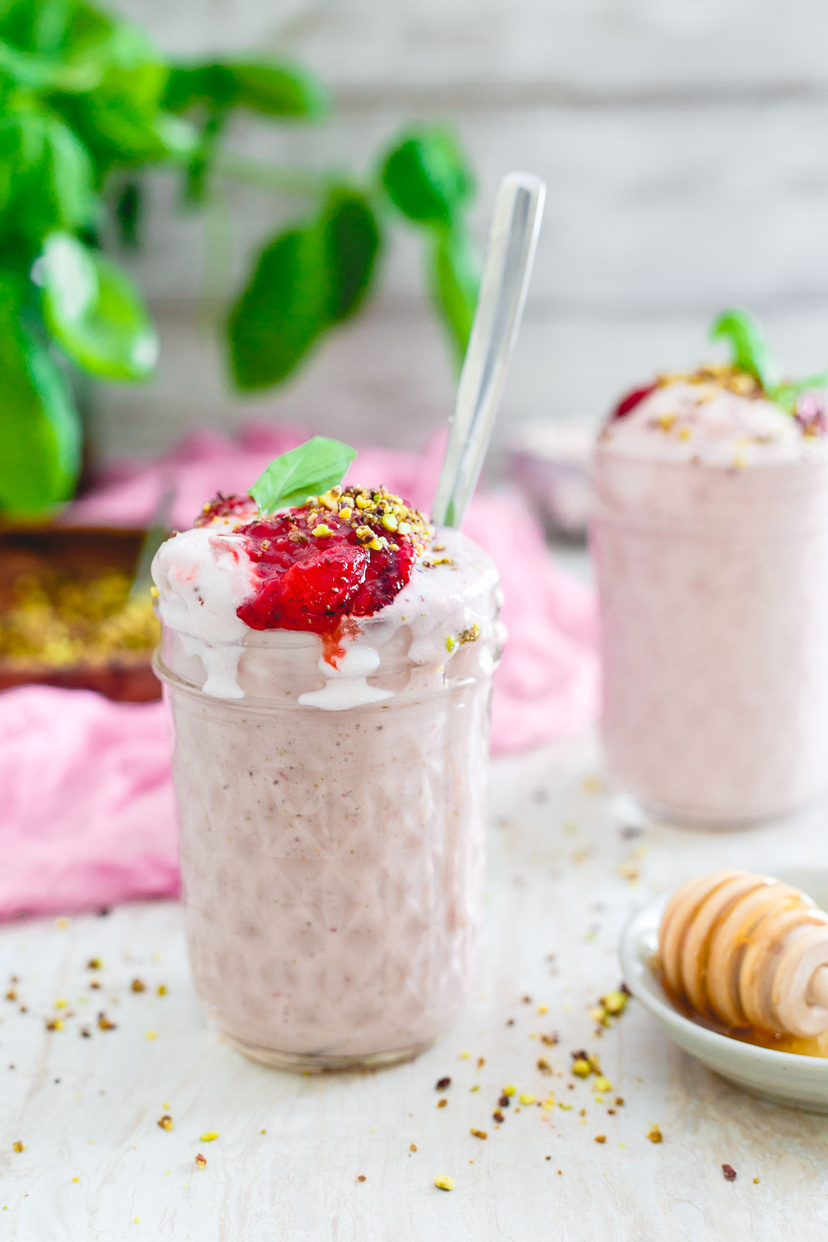 Creamy, sweet with a punch of freshness from the basil, this roasted strawberry milkshake is a delicious and healthy way to indulge!
