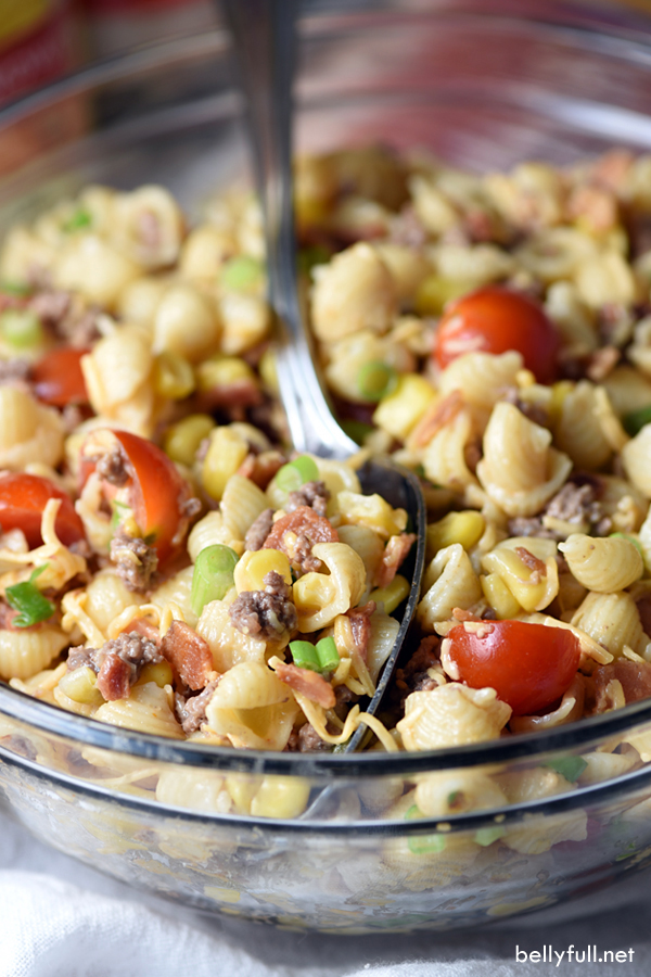 Bacon, ground beef, cheese, and hot sauce make this Cowboy Pasta Salad a definite crowd pleaser! Perfect for summer get togethers.