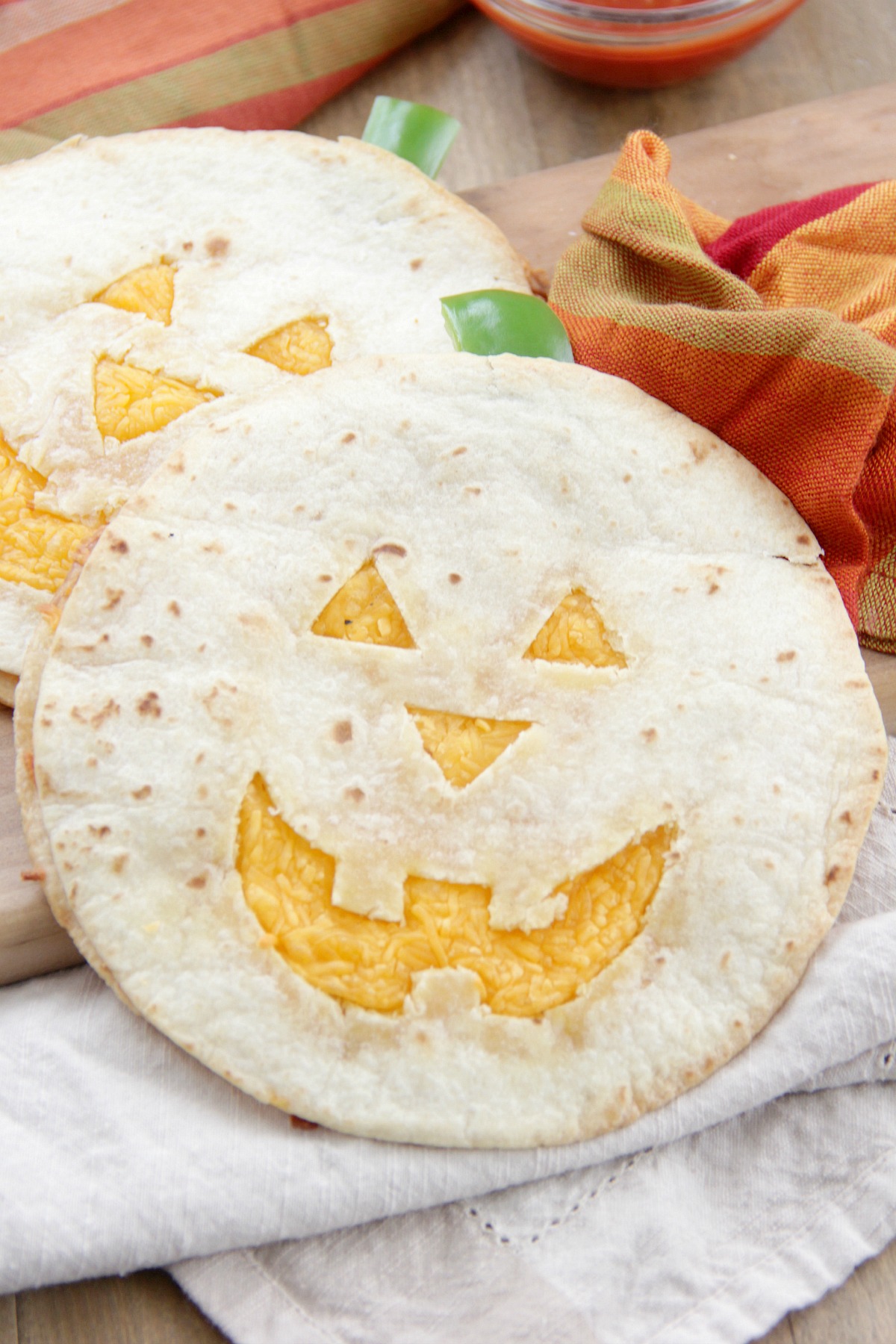 These quesadillas would be perfect to make for a quick lunch or dinner before trick-or-treating. Just serve them up with some salsa and of course, guacamole! Happy Halloween!