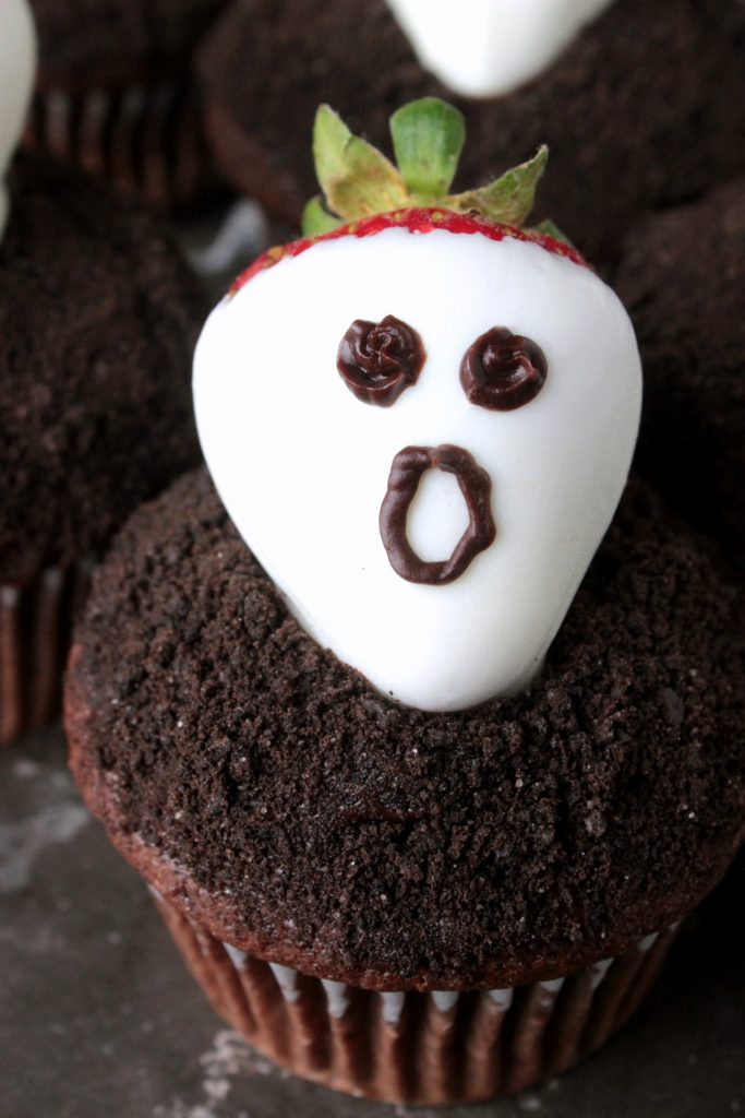 Strawberry Ghost Dark Chocolate Cupcakes - Don’t get spooked! These strawberry ghost chocolate cupcakes are nothing be scared about! They’re a sweet and easy dessert that’s perfect for Halloween!