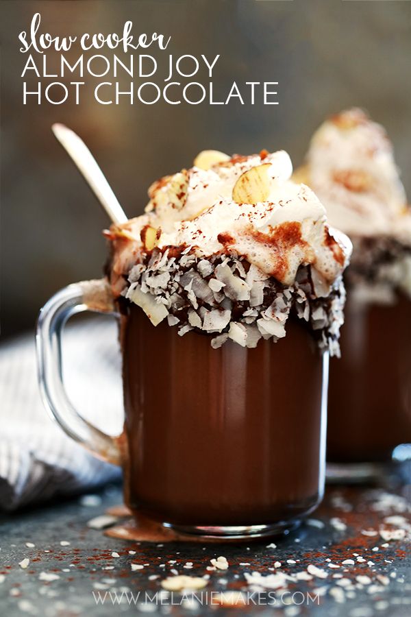 This Slow Cooker Almond Joy Hot Chocolate takes just five minutes to prepare, yet makes enough to wow a crowd! Whole milk, heavy cream, cocoa and almond extract are whisked together to form this decadently delicious treat. Garnished with whipped topping, sliced almonds and coconut flakes, this hot chocolate is easily the best around.