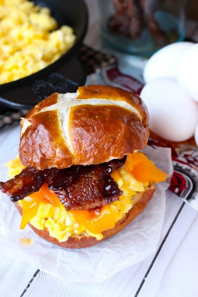 Candied Bacon Egg and Cheese Sandwiches - What's better than bacon for breakfast? Candied Bacon piled with perfectly scrambled eggs and cheddar cheese on a pretzel bun! Candied Bacon Egg and Cheese Sandwiches are the perfect way to start the day!Â 