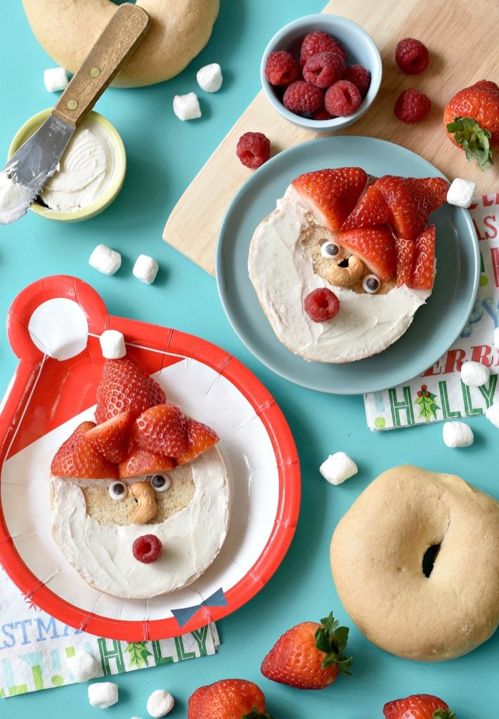 Brighten up your kids' Christmas morning with these gluten free Santa Bagels. Smothered with dairy free cream cheese and fresh fruit, this is one breakfast that is guaranteed to be on the Nice list this year. 