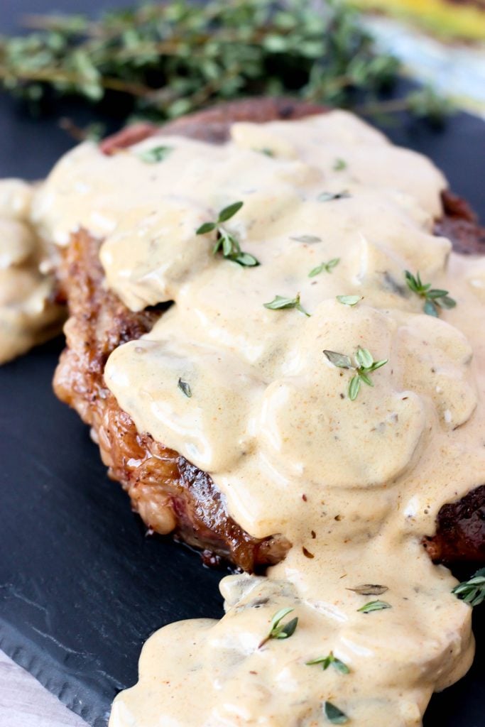 Steak with Mushroom Cream Sauce - Eating low carb doesn't mean that you have to sacrifice flavor! This Steak with Mushroom Cream Sauce is so amazing that "low carb" won't even matter! You can also make this sauce for chicken or pork! It's so good! 