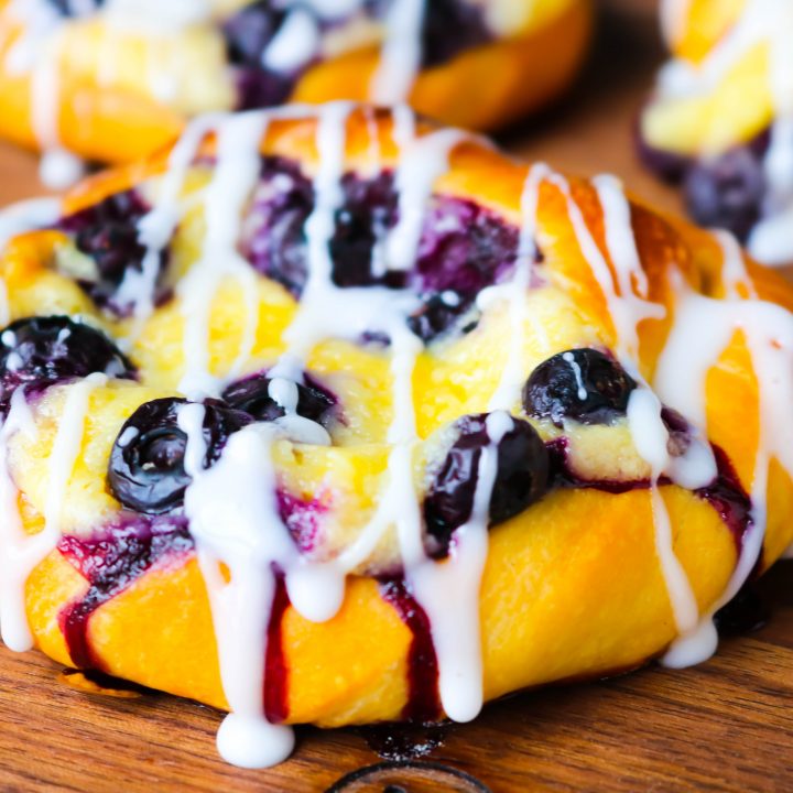 While I love a good shortcut when it comes to baking, Homemade Blueberry Cream Cheese Danishes from scratch are 100% worth it! They're filled with a cream cheese filling and topped with fresh summer blueberries! 