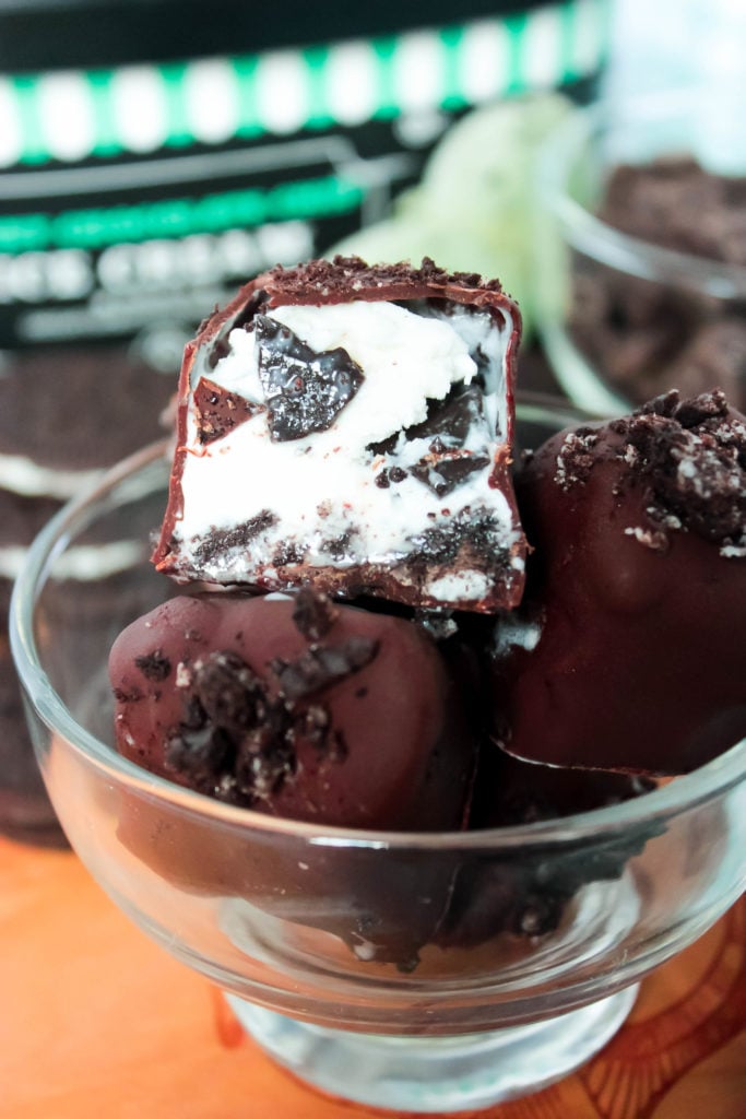 Mint Chocolate Chip Ice Cream Bites - These Mint Chocolate Chip Ice Cream Bites are easy little bites of chocolate coated ice cream. These bites can be made with homemade or storebought ice cream, however, making them with storebought ice cream makes them super easy to make! Change up the flavor of ice cream too for even more dessert fun!