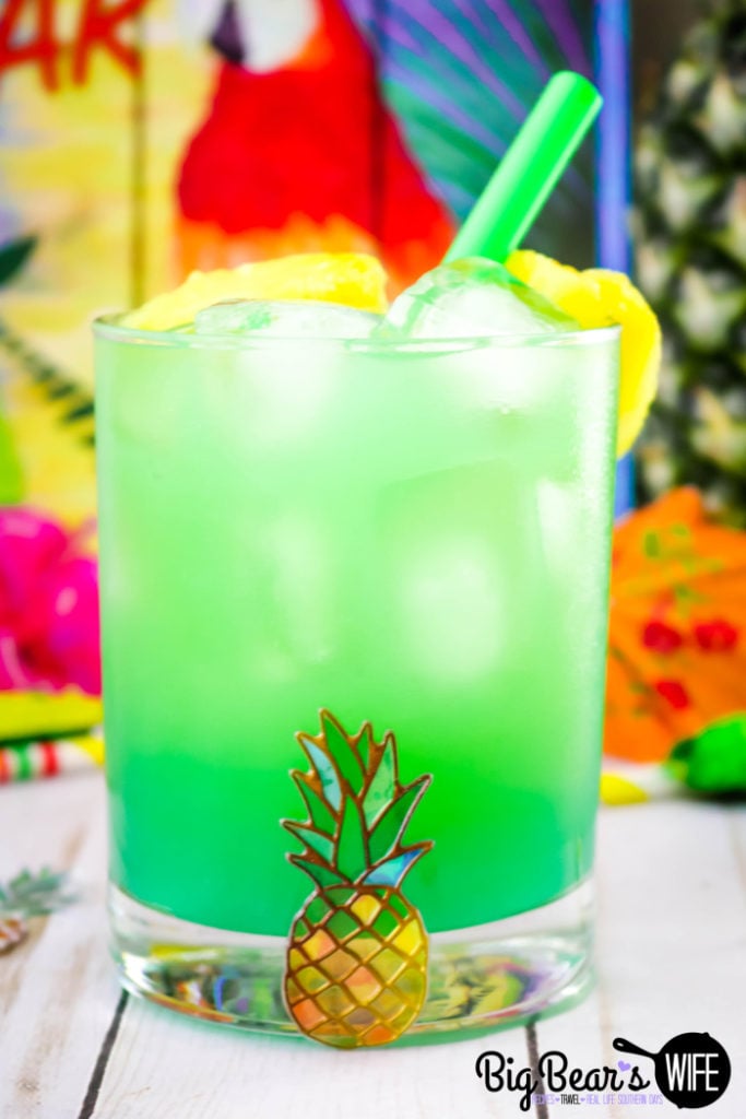 Mermaid Pineapple RumDum - This Mermaid Pineapple RumDum will make you feel like you're hanging out on the beach! It's got pineapple rum and vanilla rum mixed plus it's topped with extra pineapple! For an extra kick, soak the pineapple pieces in rum for a few days beforehand! 