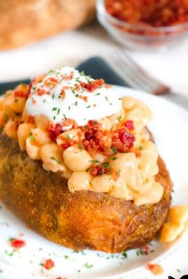 Calling all carb lovers!!! These Loaded Mac and Cheese Stuffed Baked Potatoes might be the best stuffed baked potatoes ever. Homemade Mac and cheese stuffed into a freshly baked potato is a carb lover’s dream come true!