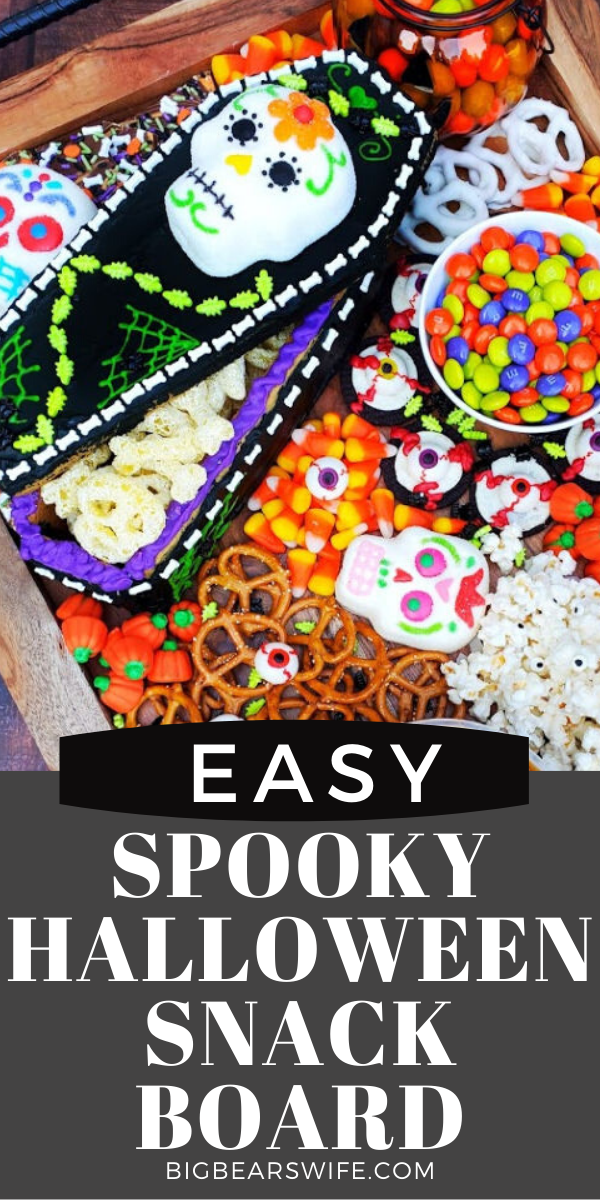 SPOOKY HALLOWEEN SNACK BOARD - Snack Boards or Charcuterie boards are super easy to put together, they look great at parties and they're fun to create to match themed and holidays! This Spooky Halloween Snack Board is perfect for Halloween and super colorful!  via @bigbearswife