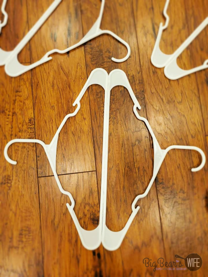 What you'll need for this DIY Dollar Tree Snowflake Clothes Hanger Craft: