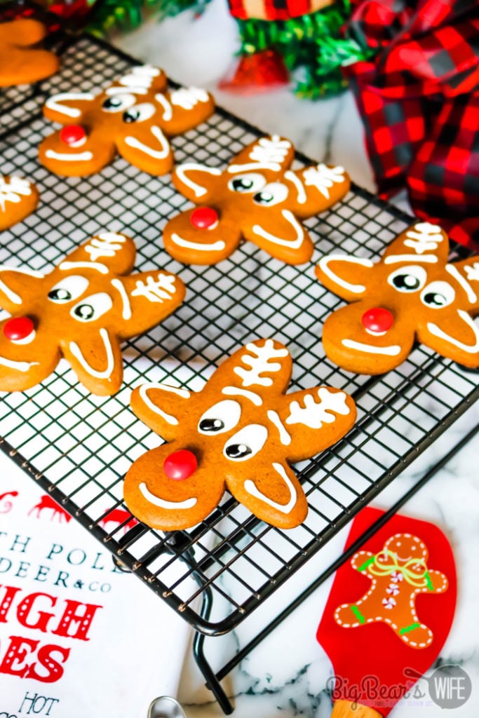 Reindeer Gingerbread Men Cookies - Upside Down Gingerbread Man Reindeer Cookies - These adorable Reindeer Gingerbread Cookies are made using an Upside Down Gingerbread Man cookie cutter, royal icing and a red chocolate candy for the nose! 