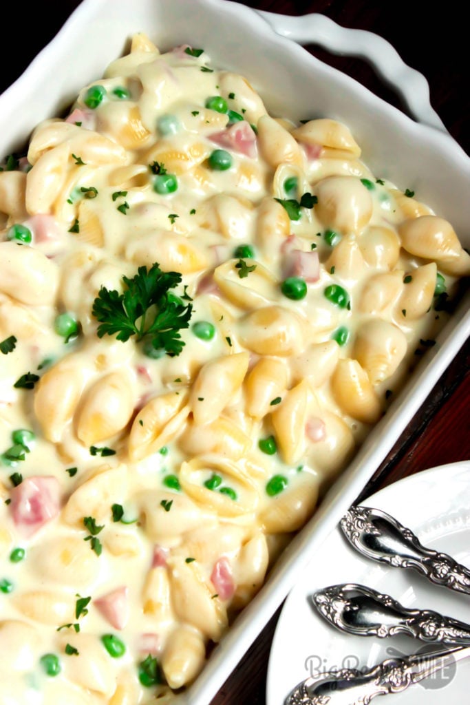 White Cheddar Macaroni and Cheese with Ham and Peas - Once you've tasted this homemade version of mac and cheese you’ll wonder why you’ve waited so long to make macaroni and cheese from scratch. This White Cheddar Macaroni and Cheese with Ham and Peas is great all year but it's perfect during the holidays for using up leftover holiday ham!