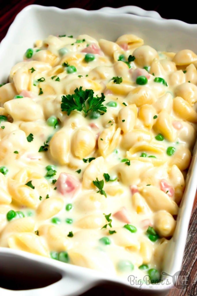 White Cheddar Macaroni and Cheese with Ham and Peas - Once you've tasted this homemade version of mac and cheese you’ll wonder why you’ve waited so long to make macaroni and cheese from scratch. This White Cheddar Macaroni and Cheese with Ham and Peas is great all year but it's perfect during the holidays for using up leftover holiday ham!