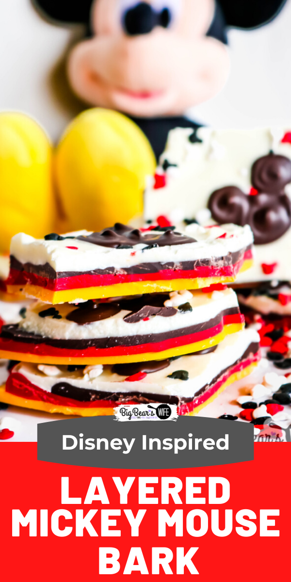 This Layered Mickey Mouse Bark is a fun Mickey Mouse inspired treat that shows off all of Mickey's signature colors! This Mickey bark is super easy to make and would be a perfect dessert or party favor for any Disney fan! via @bigbearswife
