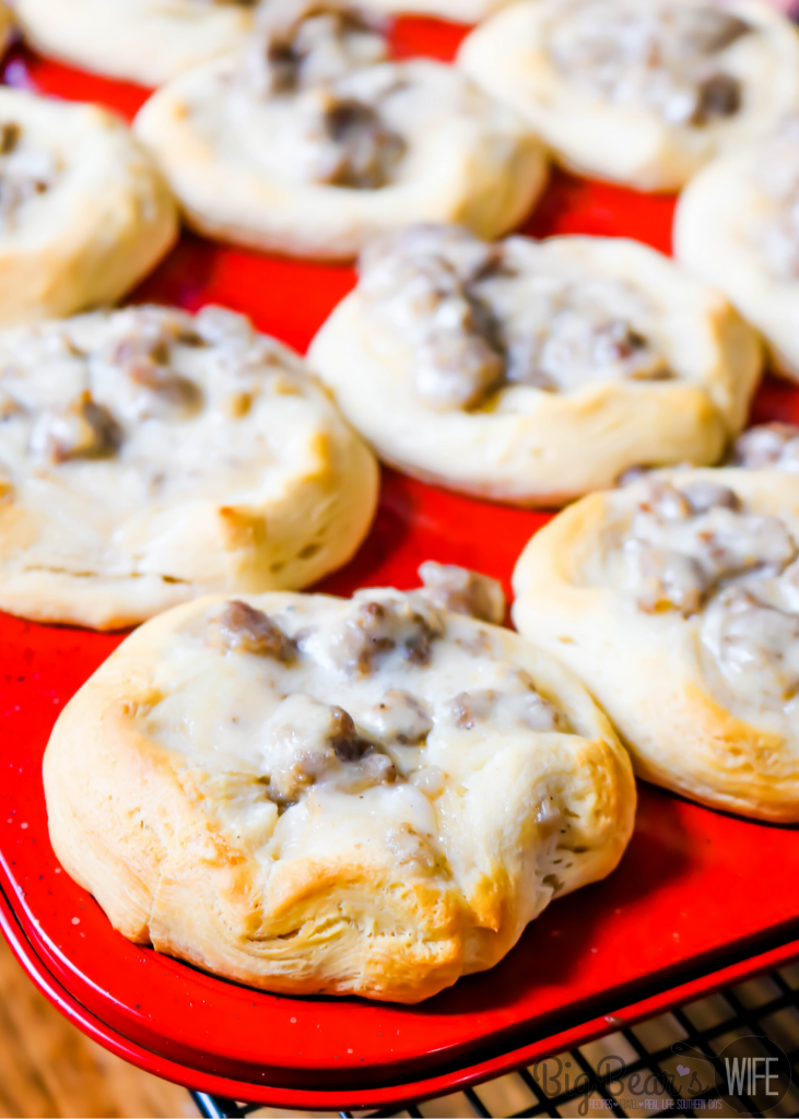 Sausage and Gravy Biscuit Cups in red muffin tin