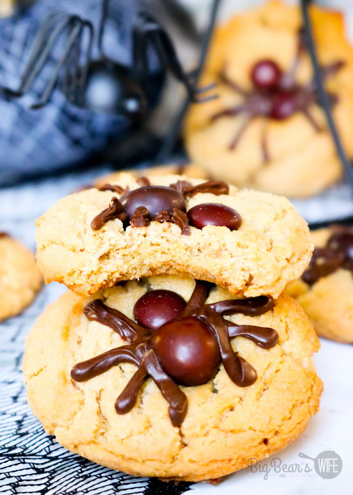 This Peanut Butter Spider Cookies recipe is an easy Halloween cookie recipe! These easy spider cookies are based on my favorite Peanut Butter Blossoms and the spiders are made with brown M&Ms and melted chocolate chips! 