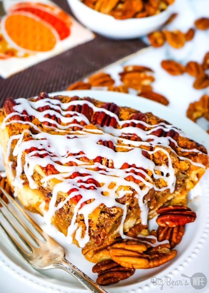 This Cinnamon Bun Pecan Pie has a cinnamon bun pie crust and an amazing and easy homemade pecan pie filling! Drizzle it with cream cheese frosting and you've got the perfect marriage of cinnamon buns and pecan pie!