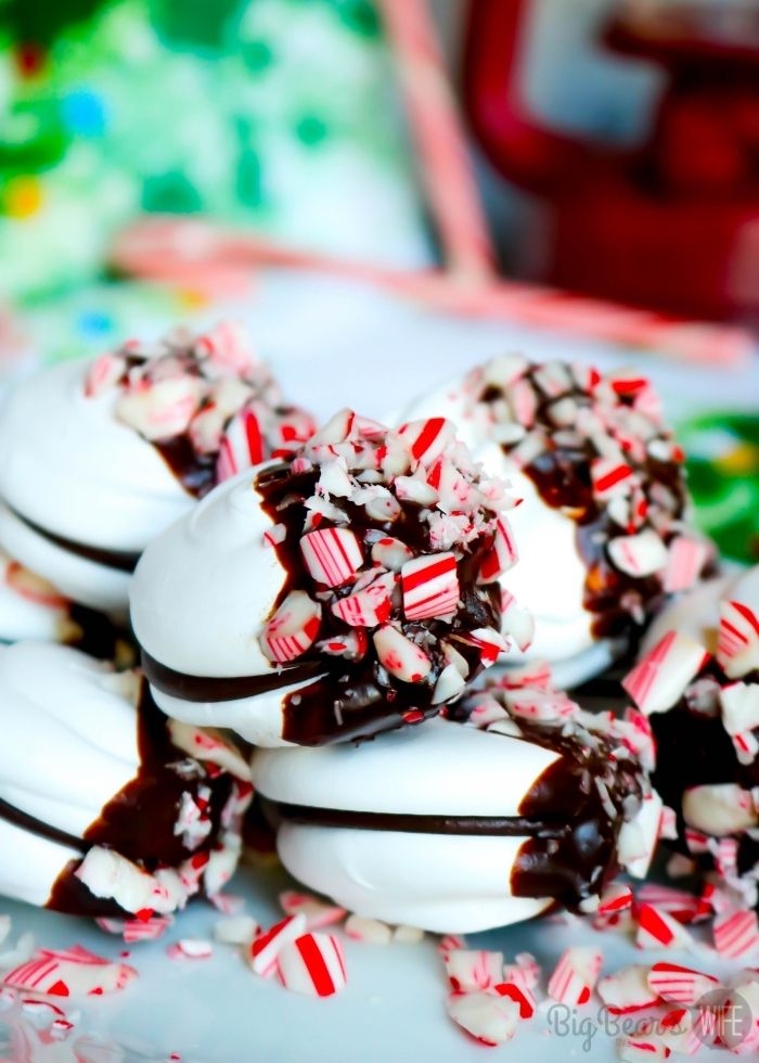 Chocolate-Dipped Meringue Sandwich Cookies with crushed candy canes 