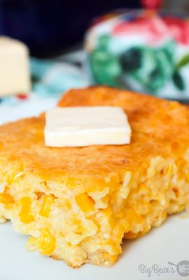 Slice of Creamed Corn Cornbread _ Creamed Corn Casserole with a pat of butter on a white plate (1)