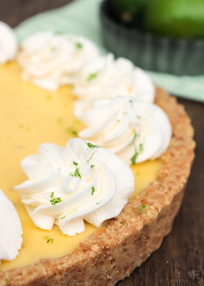 Whipped Cream and Lime zest on Key Lime Tart