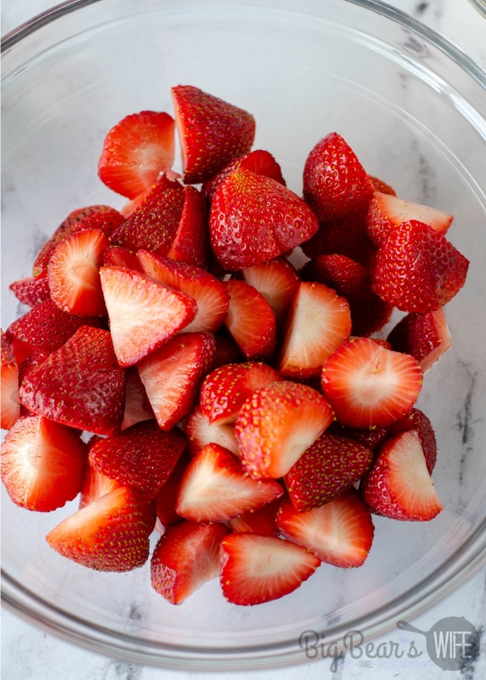 Sliced Strawberries in glass bowl
