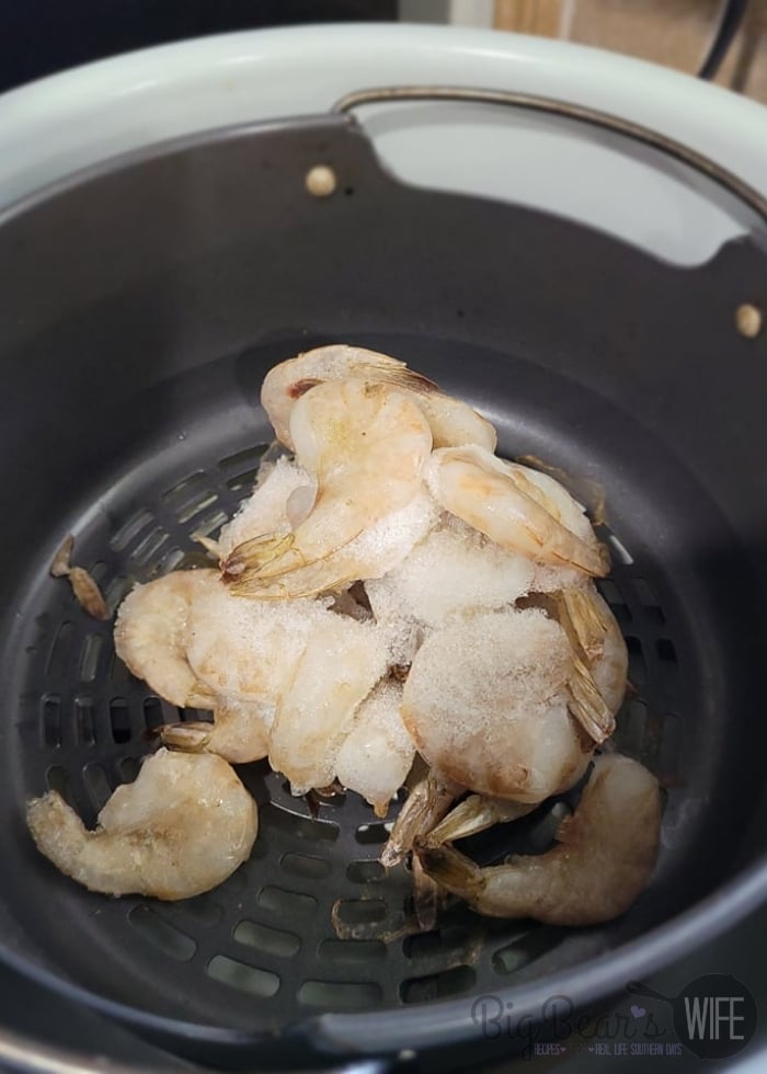 Frozen chunk of raw shrimp in air fryer