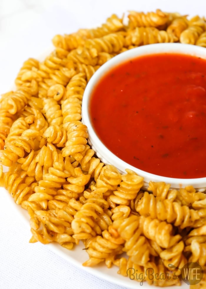 Crispy Air Fryer Pasta Chips with pasta sauce for dipping