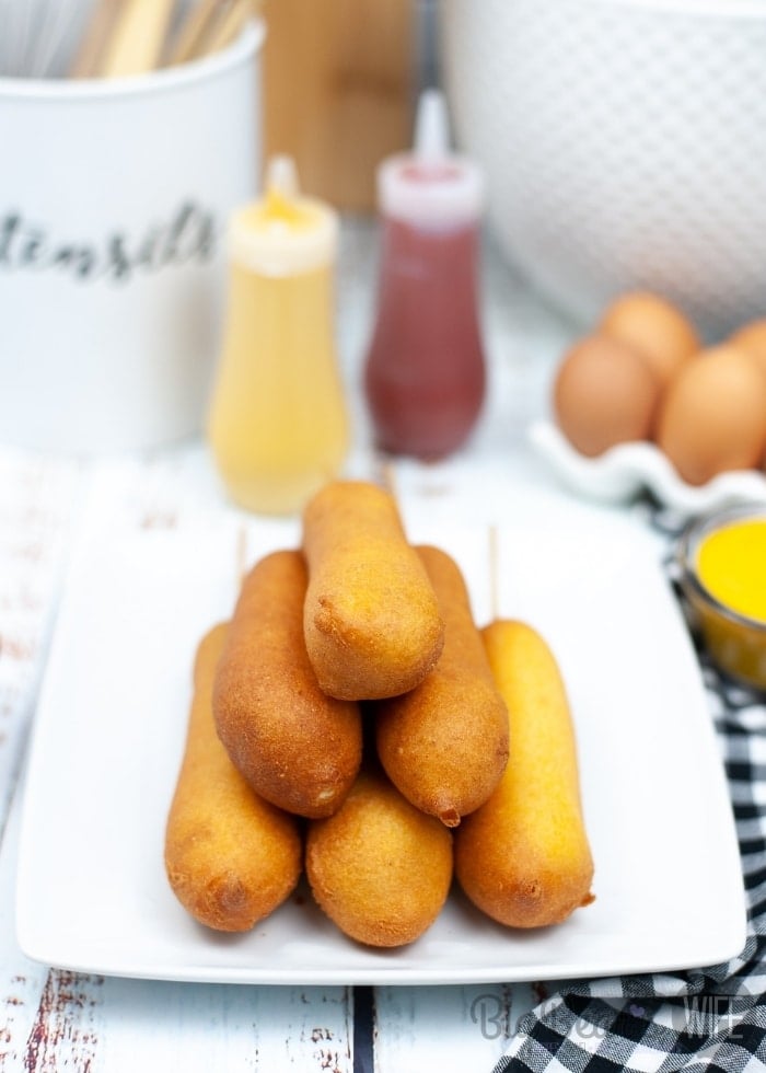 Fallen in love with Disneyland Corn Dogs? Wishing you would make it to Disneyland for the famous corn dogs? Make them at home with this great recipe for Disneyland Copycat Corn Dogs!