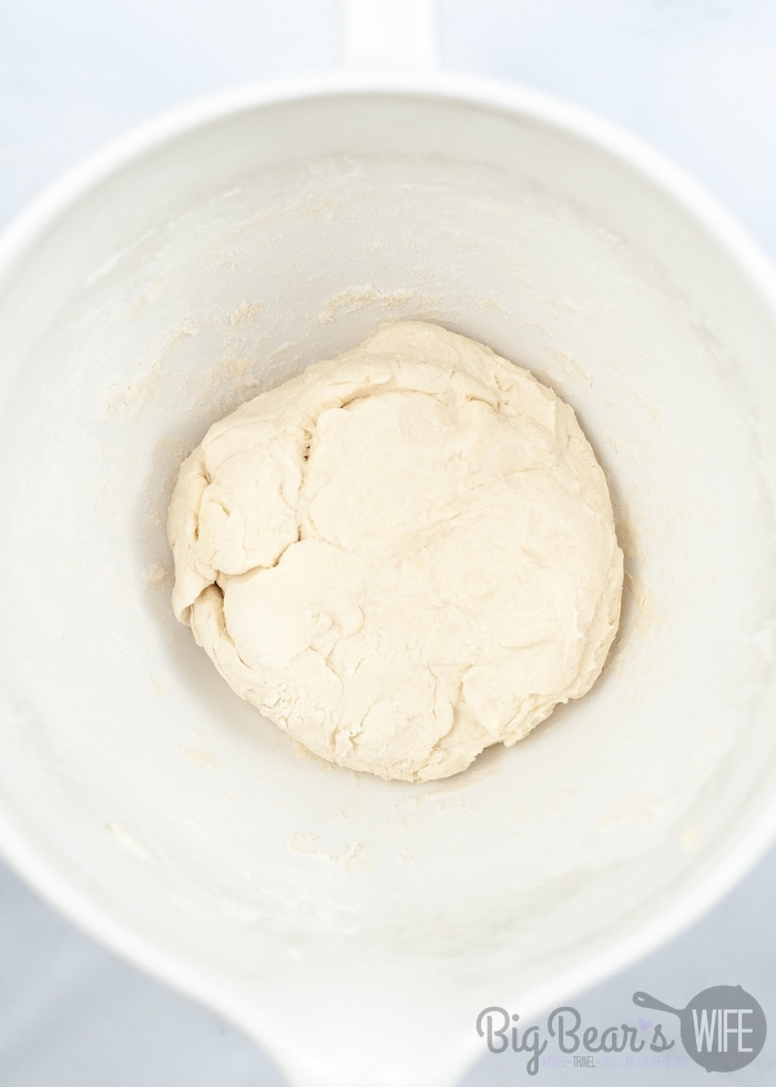 dough in white mixing bowl