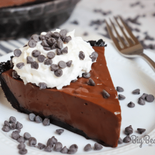 Triple Chocolate Pie - A homemade, creamy and amazing chocolate pie that has a chocolate cookie crust, chocolate pie filling and topped with lots of mini chocolate chips!