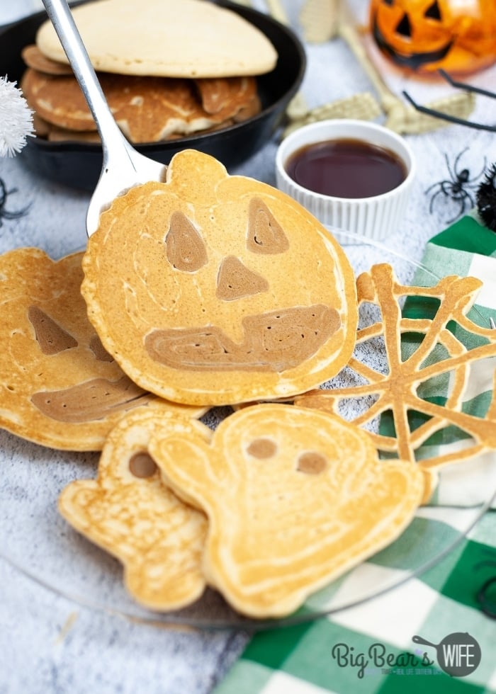 A Halloween breakfast that is perfect for any spooky Monster! These Halloween Pancakes are shaped like ghosts, pumpkins and spiderwebs!