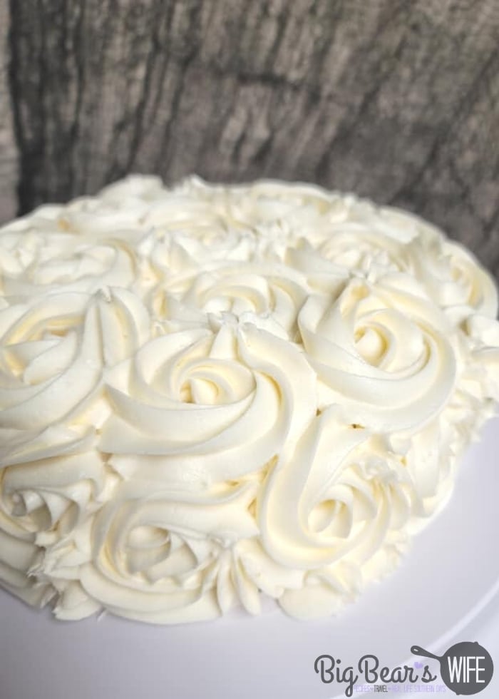 Fill a piping bag that’s been fitted with a large star tip with the rest of the frosting. Pipe swirls all over the cake.