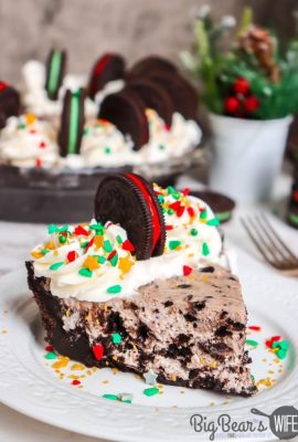 a Slice of HOLIDAY OREO PIE on a white plate with Christmas sprinkles