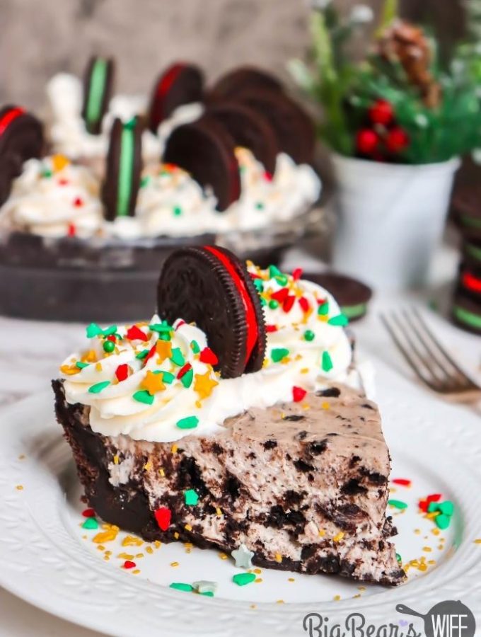 a Slice of HOLIDAY OREO PIE on a white plate with Christmas sprinkles