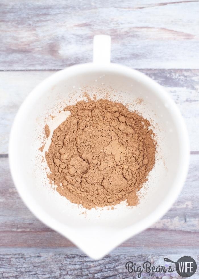 cocoa powder in a white mixing bowl